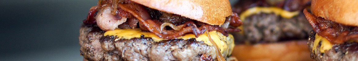 Eating Burger at Big Daddy's Burgers restaurant in Pharr, TX.